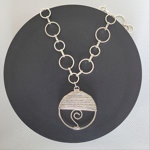 Vintage silver loop necklace with circular  wire wrapped pendant